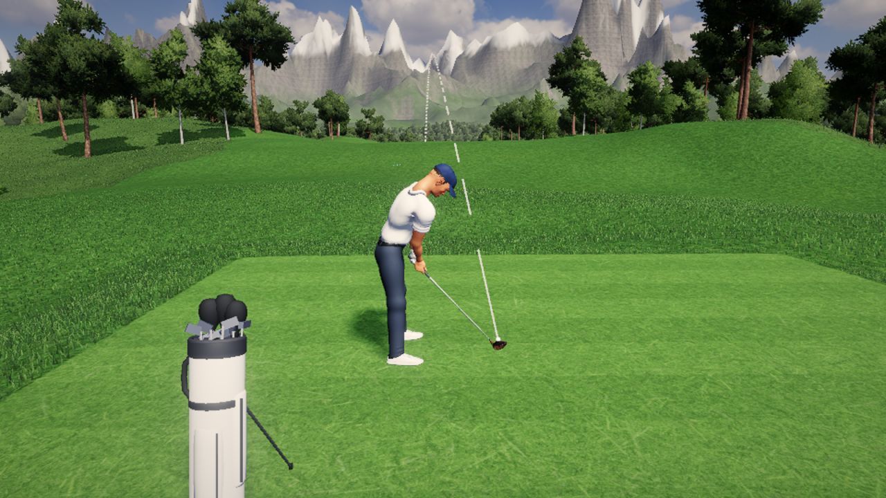 A tee shot below snowy peaks at Summit Peaks